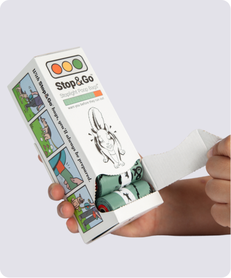 The open Stop & Go box with the rolls visible inside and the paper tab pulled out